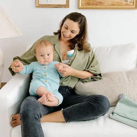 Mother using Night Owl V2 wearable breast pump for exclusive pumping, showing hands-free 300mmHg suction power and comfortable milk expression